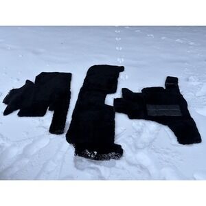 A SET OF 3 ROLLS ROYCE BLACK SHEEPSKIN OVER RUGS by PAUL BLANCHE